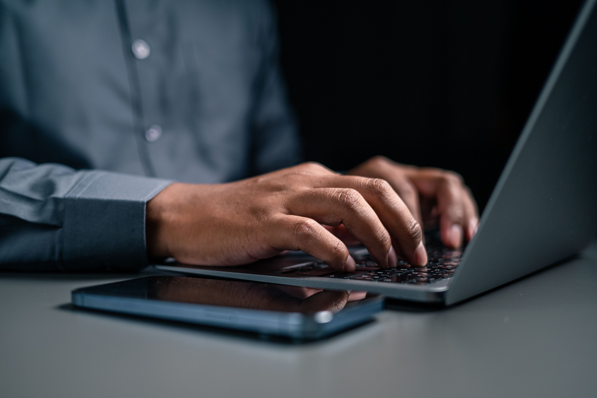 A man hand using laptop are working and Plan your savings money for your family.